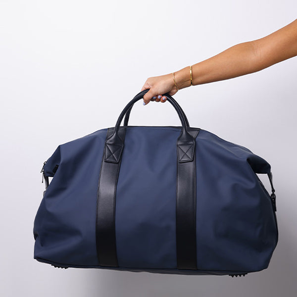 LARGE NAVY - DUFFLE BAG - BLACK HANDLE 79x26.5x36cm - 79x26.5x36cm حقيبة كتف كبيرة باللون الكحلي - مقبض أسود