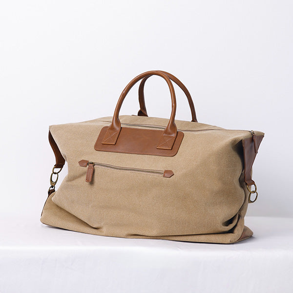 LARGE KHAKI DUFFLE BAG WITH SHOULDER STRAP - BROWN STRAP 83x18x45cm - 83x18x45cm حقيبة يد كبيرة باللون الكاكي مع حزام كتف - حزام بني