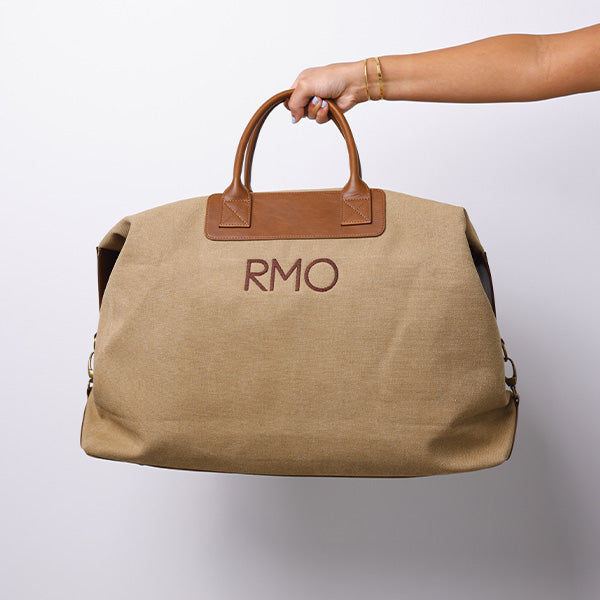 MEDIUM KHAKI DUFFLE BAG WITH SHOULDER STRAP  - BROWN STRAP 78x15x39cm - 78x15x39cm حقيبة يد كاكي متوسطة الحجم مع حزام كتف - حزام بني